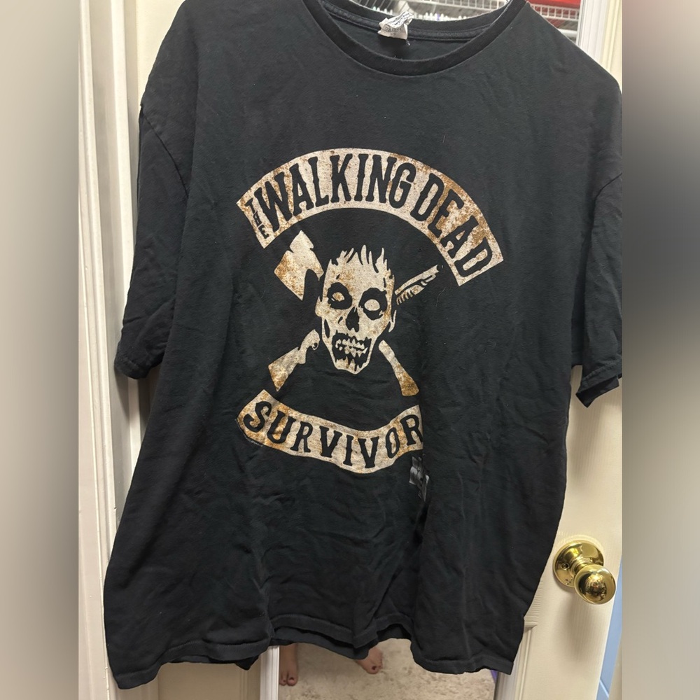 Walking dead T shirts. Faces is xl, words only is a 2xl.